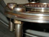 long notch worn where the retainer plate sits in the groove